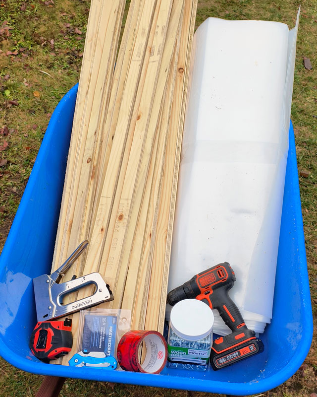 Tools and supplies to wrap chicken run.